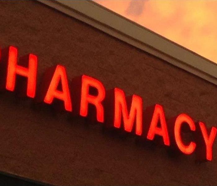 A large sign that says "Pharmacy"
